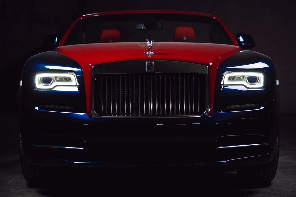 Front car portrait glowing headlights