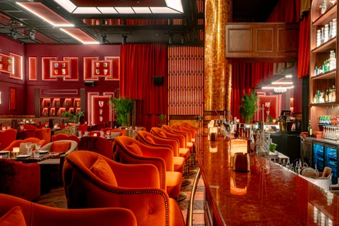 Orange bar stools in perspective
